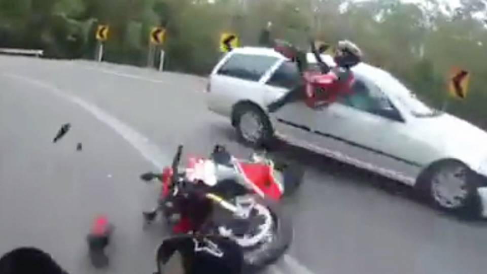 Crazy Video Shows Biker Trapped Under Car After Scary Crash | RTM ...